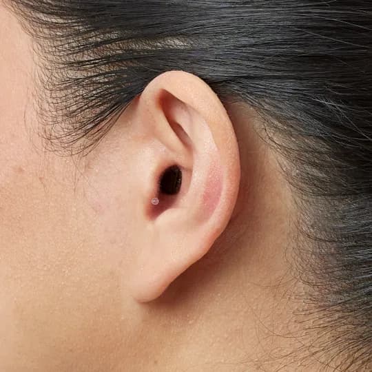 Invisible-in-Canal (IIC) worn in ear